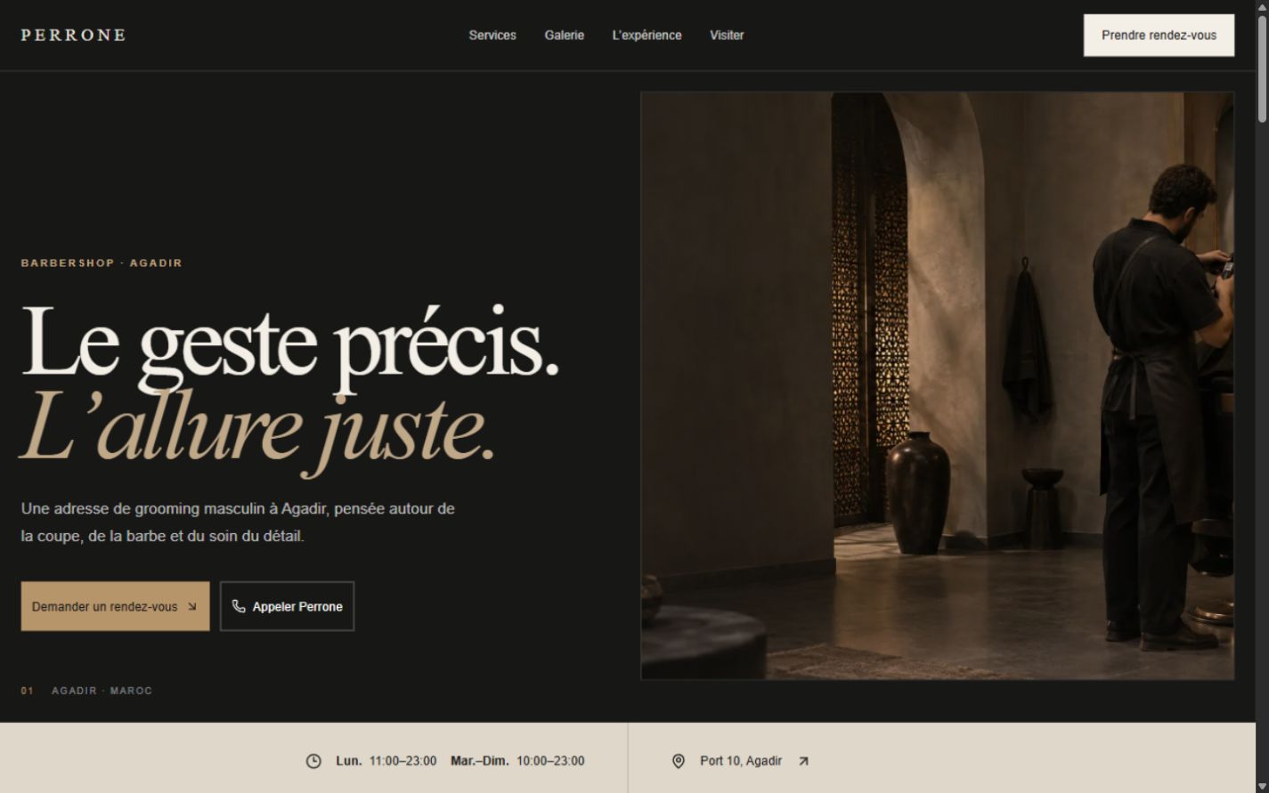 Perrone concept homepage with editorial typography and a warm, contemporary barbershop interior
